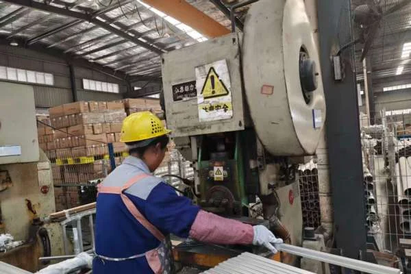 CNC Sawing Cutting at Xingyong aluminum pole factory