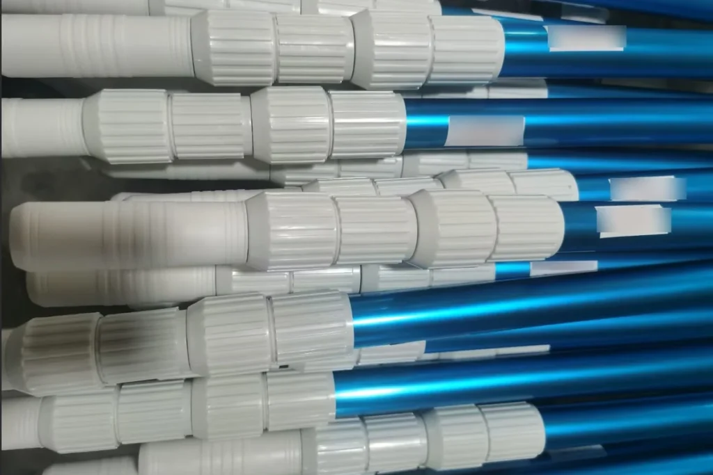 Blue anodized aluminum pool pole sections with white twist-lock collars bundled together