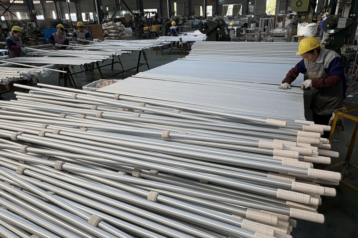 Xingyong factory production line assembling silver aluminum telescopic pool poles for The Home Depot