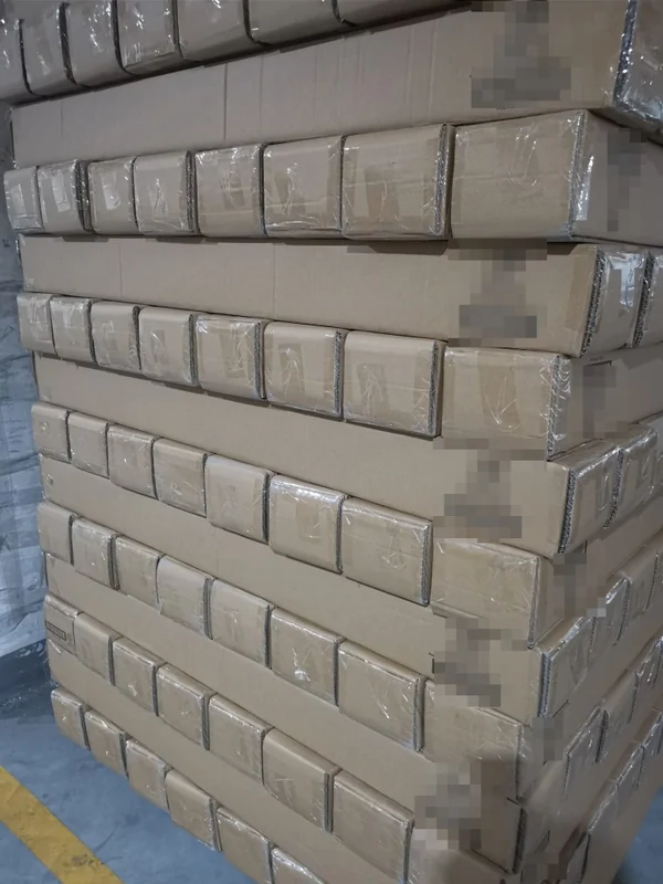 Palletized and shrink-wrapped retail cartons of custom 4-section poles ready for export