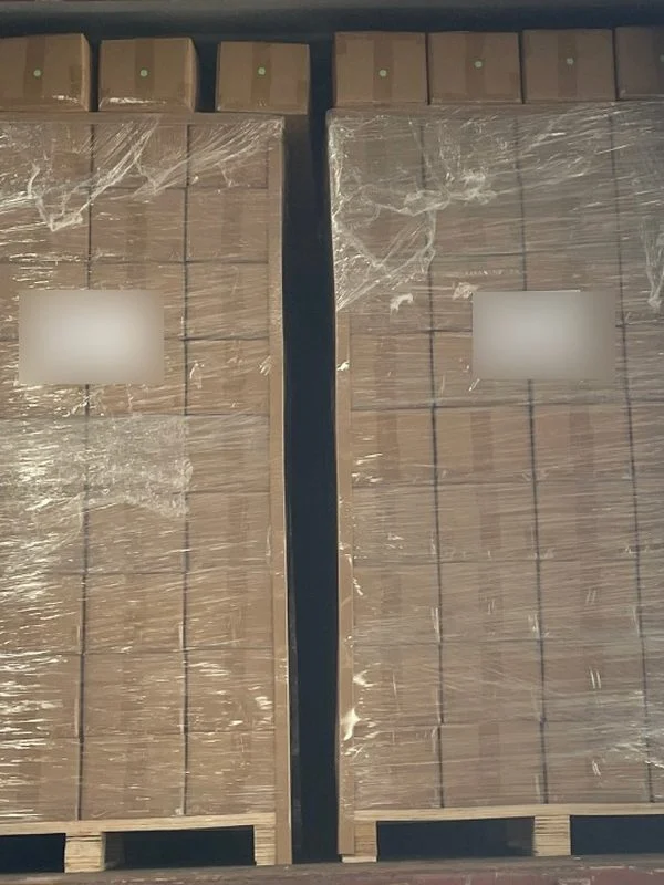 Shrink-wrapped pallets of aluminum telescopic poles in export container