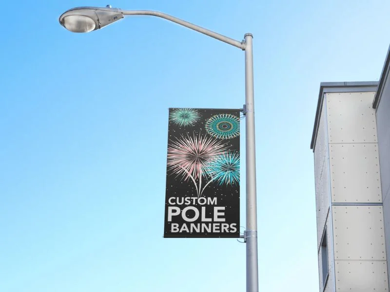 Street pole banners mounted on light poles along a main street