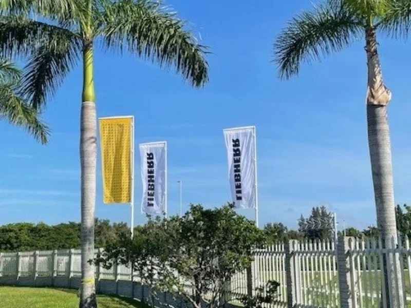 Banner pole kit with arms and hardware in branded box
