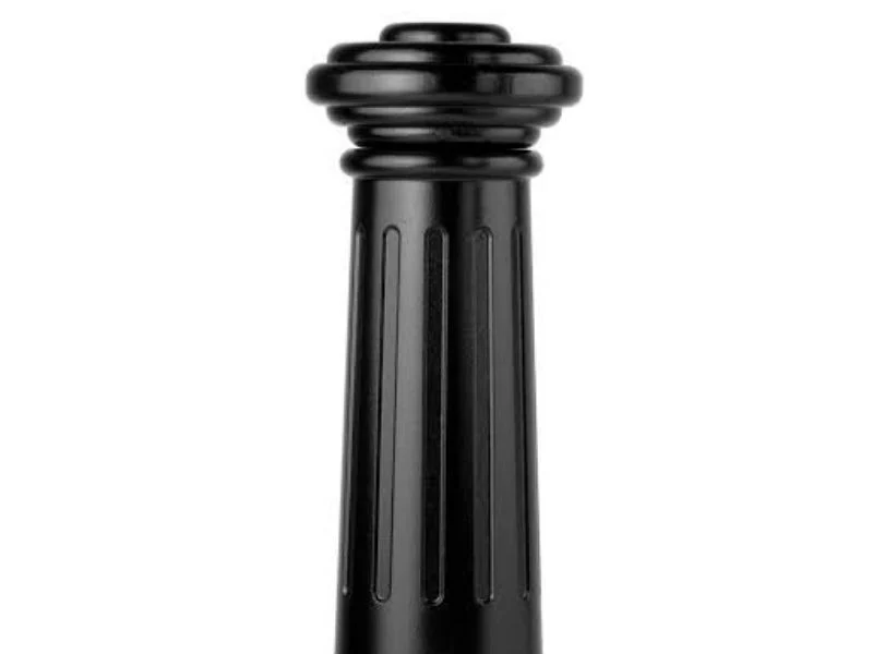 Aluminum bollard cover sliding over a steel pipe