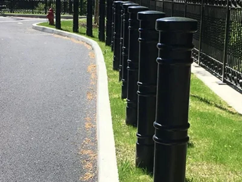 Machined bases molded caps and plugs for bollards