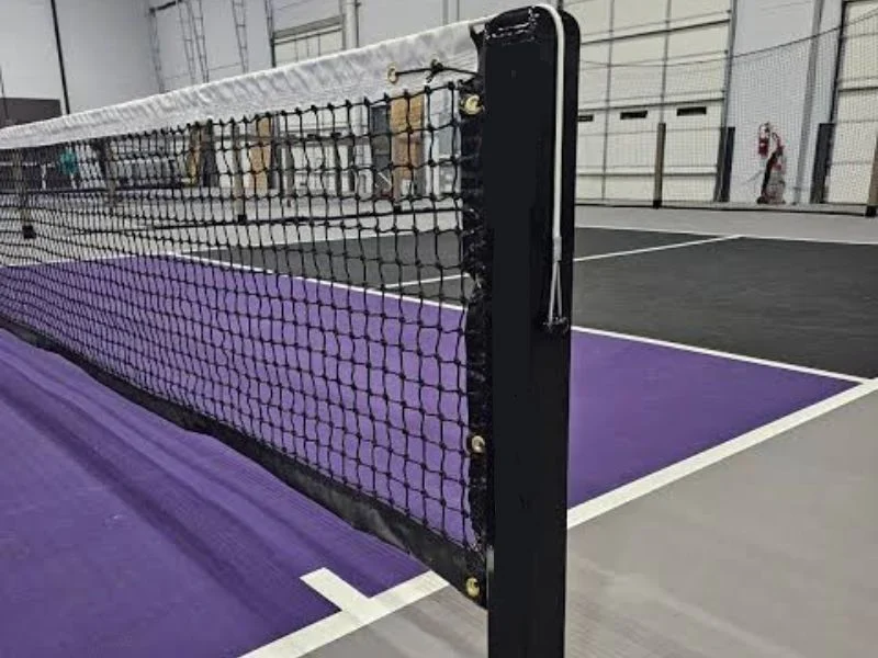 Portable pickleball net system folded and deployed