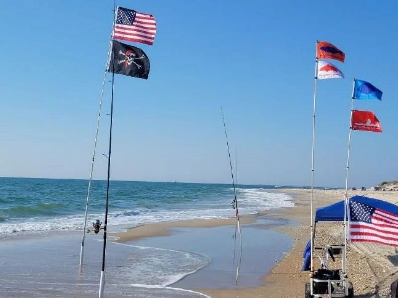 Molded sand auger base for beach flag pole