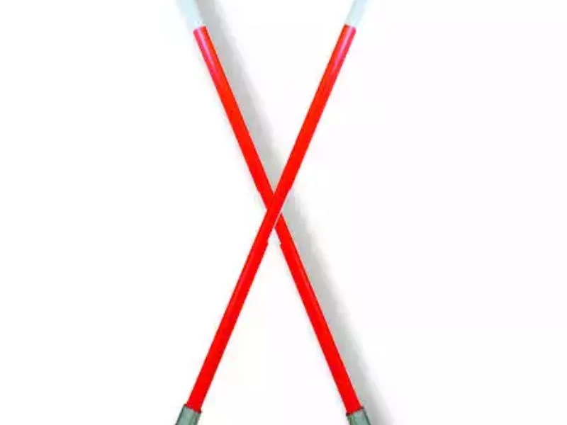 Heavy duty snow plow markers along a commercial parking lot edge