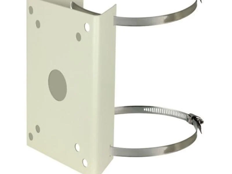 Machined camera plate, pole clamp and flange base laid out next to an aluminum tube