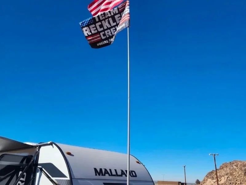 Hitch receiver mount flag pole on a truck